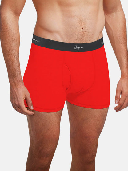 Red, black, and blue boxer trunks in a 3-pack by Hiqua Apparel, featuring 3-inch waistband and multi-color design.