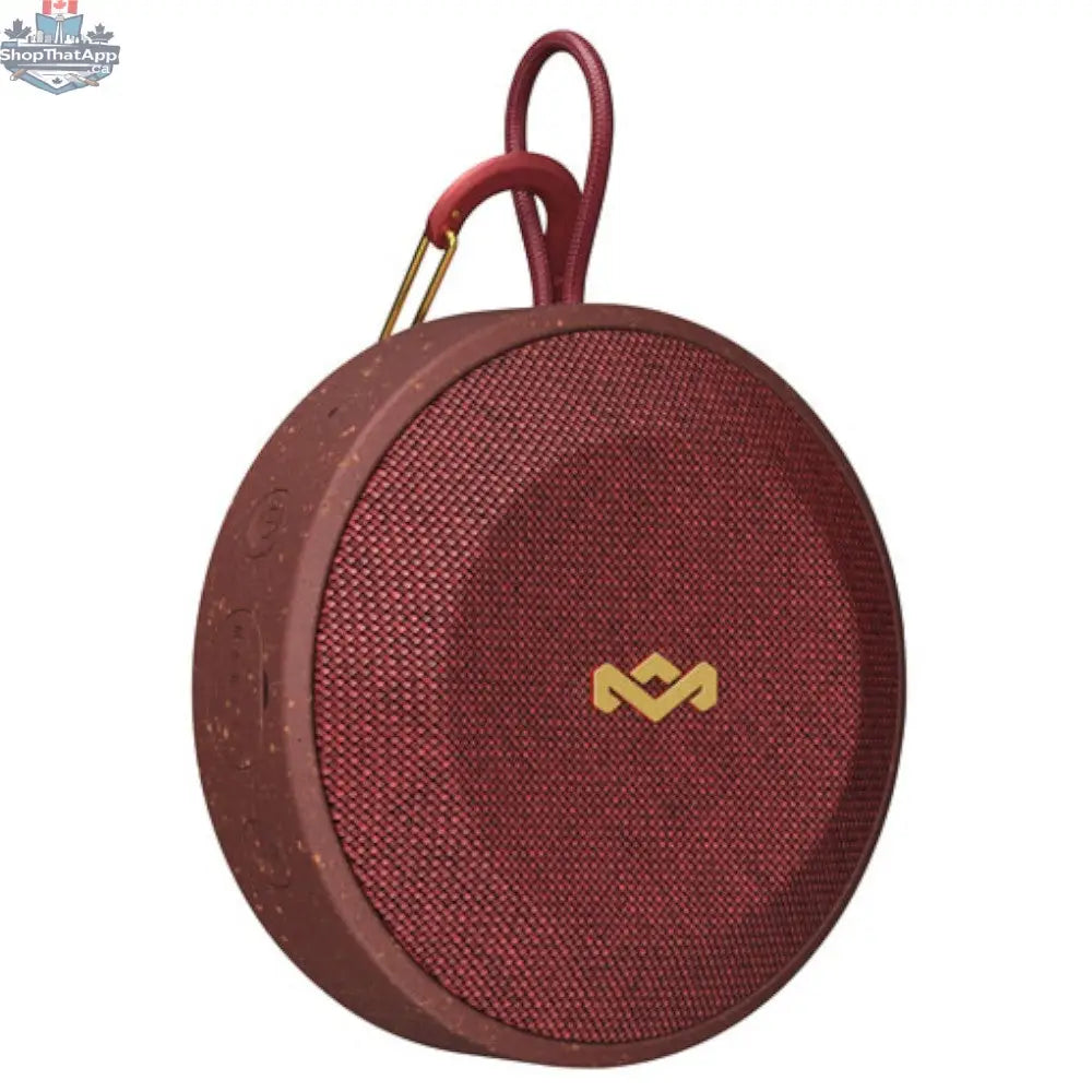 House of Marley No Bounds outdoor Bluetooth speaker in red, showing the speaker's compact design and textured exterior.
