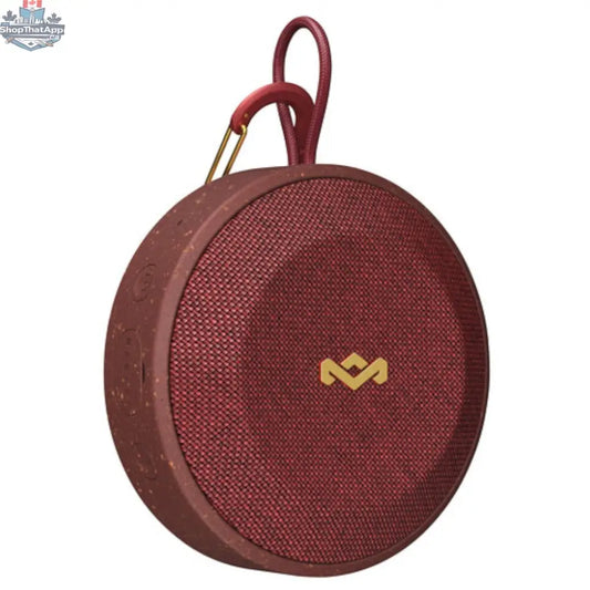 House of Marley No Bounds outdoor Bluetooth speaker in red, showing the speaker's compact design and textured exterior.