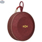 House of Marley No Bounds outdoor Bluetooth speaker in red, showing the speaker's compact design and textured exterior.