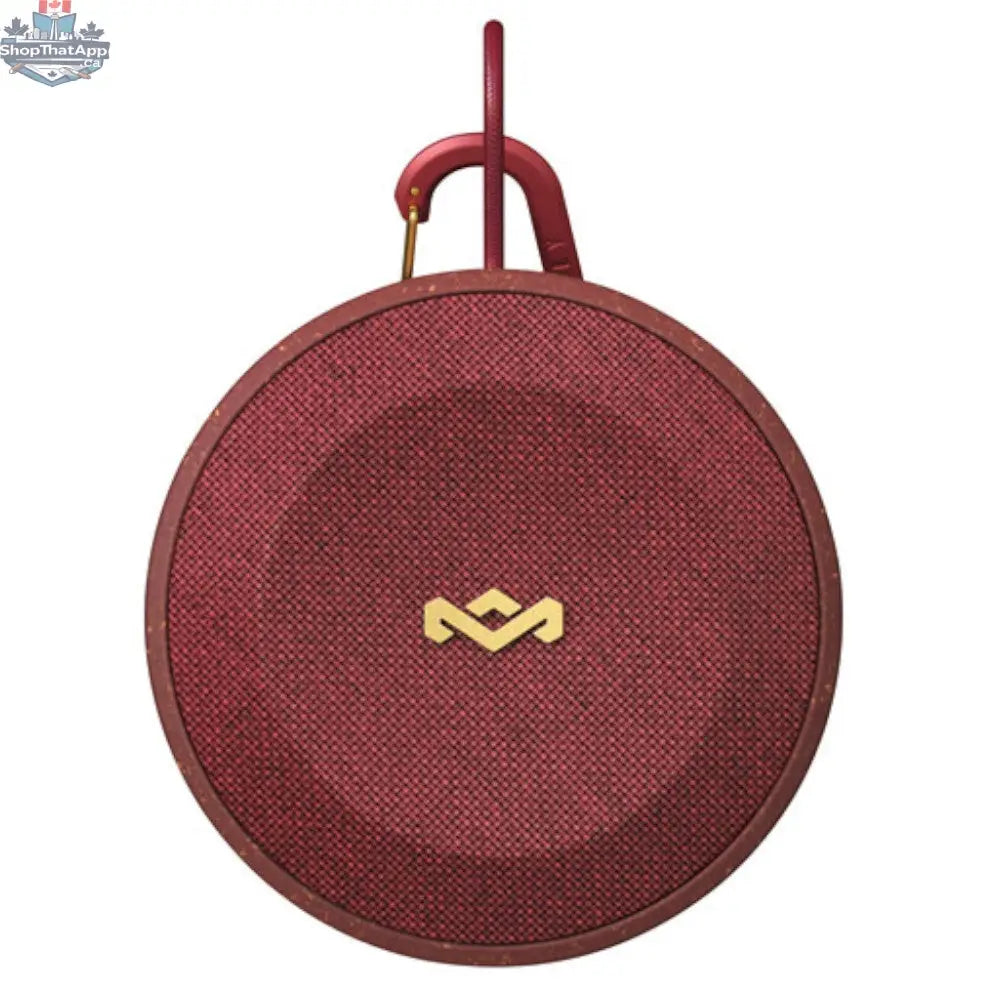 House of Marley No Bounds outdoor speaker in red, showing rugged design and portable features for outdoor listening.