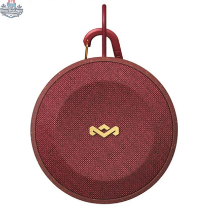 House of Marley No Bounds outdoor speaker in red, showing rugged design and portable features for outdoor listening.