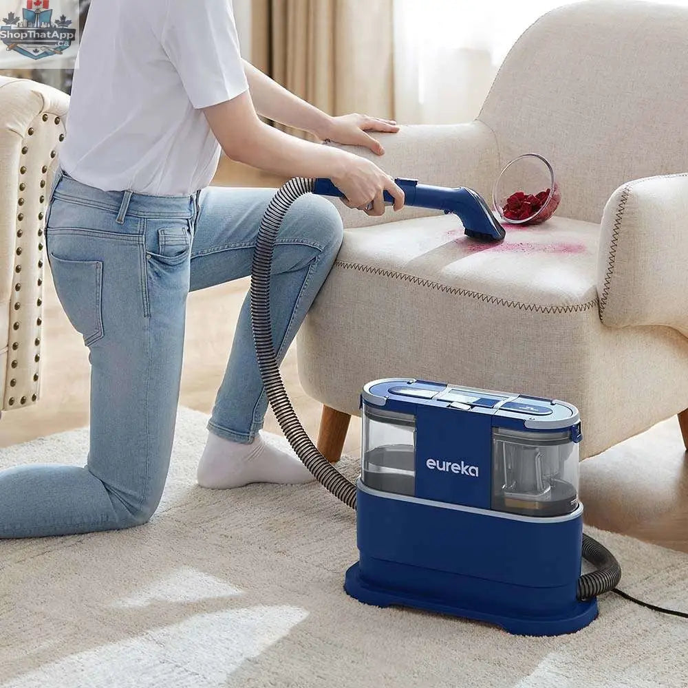 Home Essentials Outlet Eureka NEY100 portable carpet cleaner with compact design and washable water tanks, ideal for quick spot cleaning.