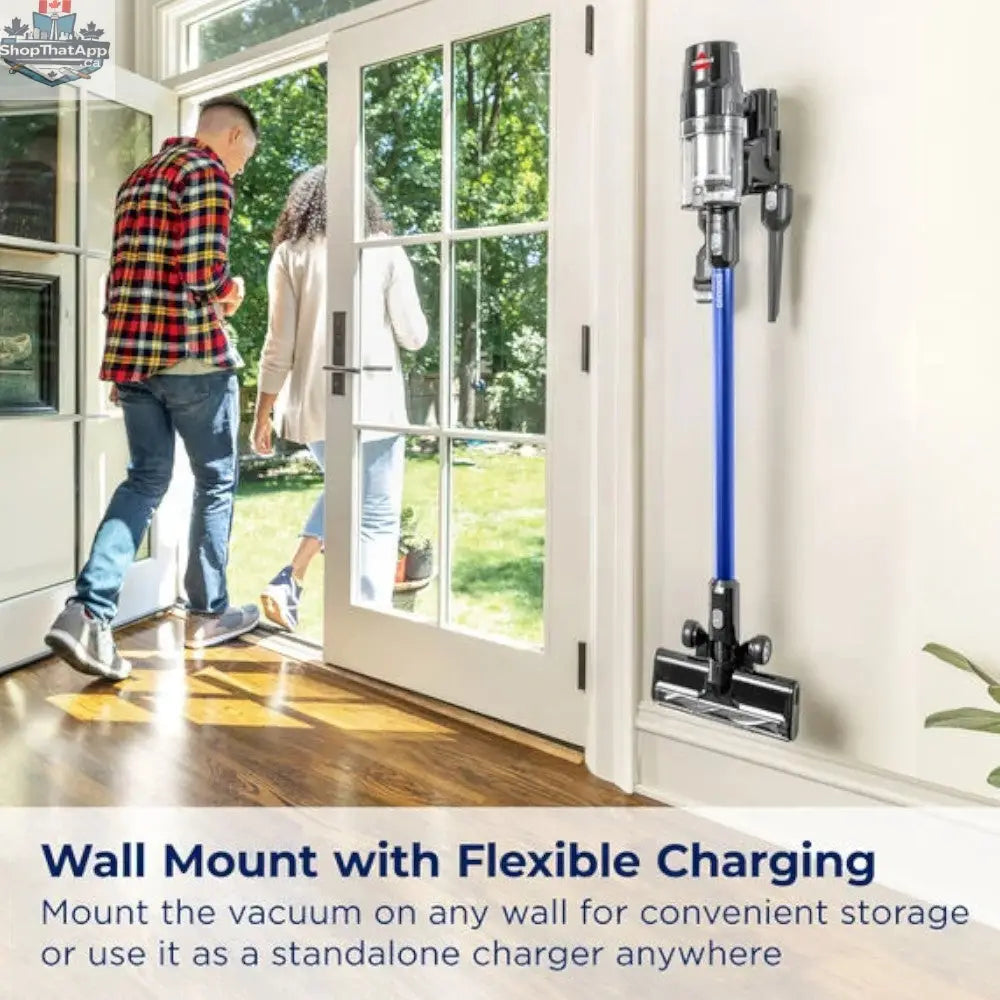 Home Essentials Outlet BISSELL PowerClean XR cordless stick vacuum with 200W motor, shown in a cleaning scene.