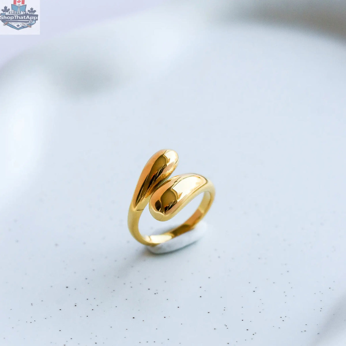 Elegant gold ring featuring intricate baguette-cut gemstones, handcrafted by HoraceJewelry, showcasing fine artisan jewelry craftsmanship.