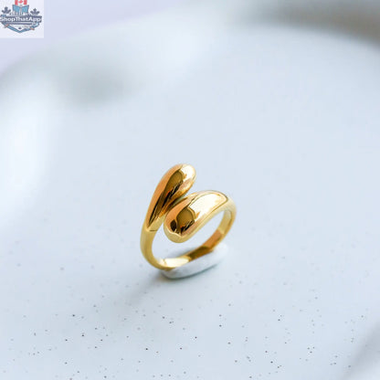 Elegant gold ring featuring intricate baguette-cut gemstones, handcrafted by HoraceJewelry, showcasing fine artisan jewelry craftsmanship.