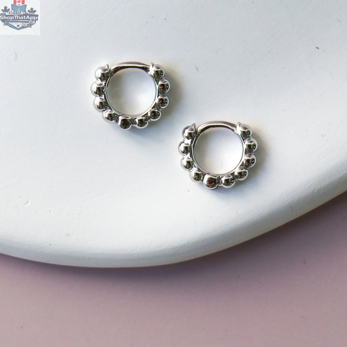 Gold hoop earrings from HoraceJewelry with intricate detailing, perfect for elegant and stylish accessories.