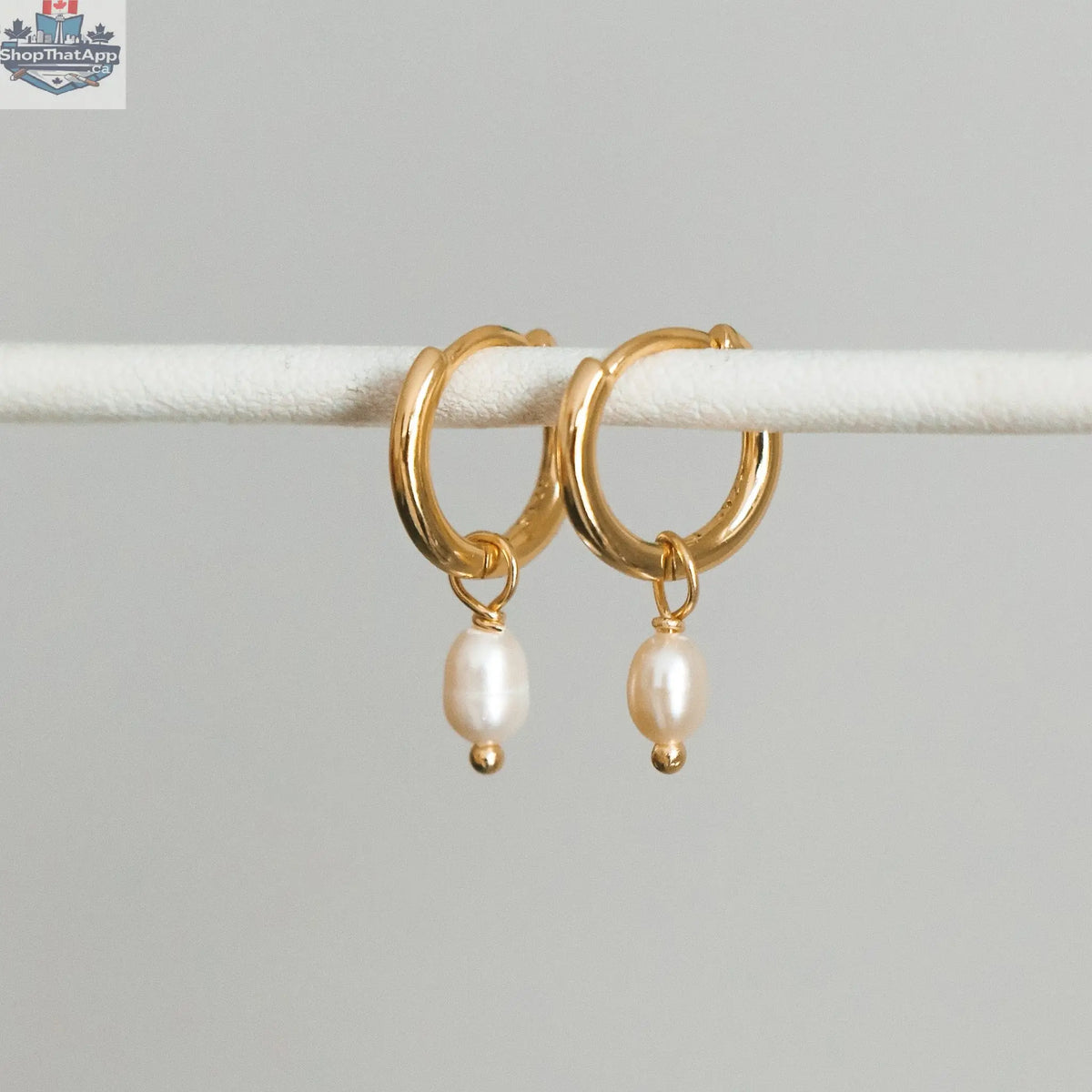 HoraceJewelry Dolko Shoes stylish earrings with boucle design, showcasing elegant gold-tone hoops and intricate detailing.