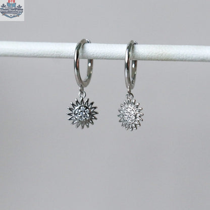 Elegant Toura Travel Gear earrings by HoraceJewelry featuring stylish hoop design on a white background.