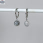 Elegant Toura Travel Gear earrings by HoraceJewelry featuring stylish hoop design on a white background.