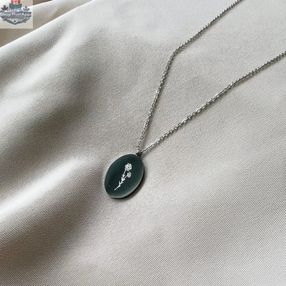 Elegant floral-themed necklace from HoraceJewelry featuring intricate flower details, perfect for October celebrations.