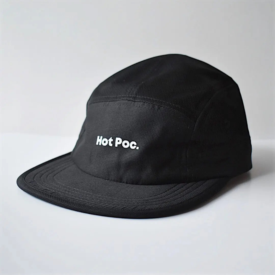 Black Hot Poc lightweight outdoor sports cap with breathable fabric and curved brim, designed for active outdoor wear.