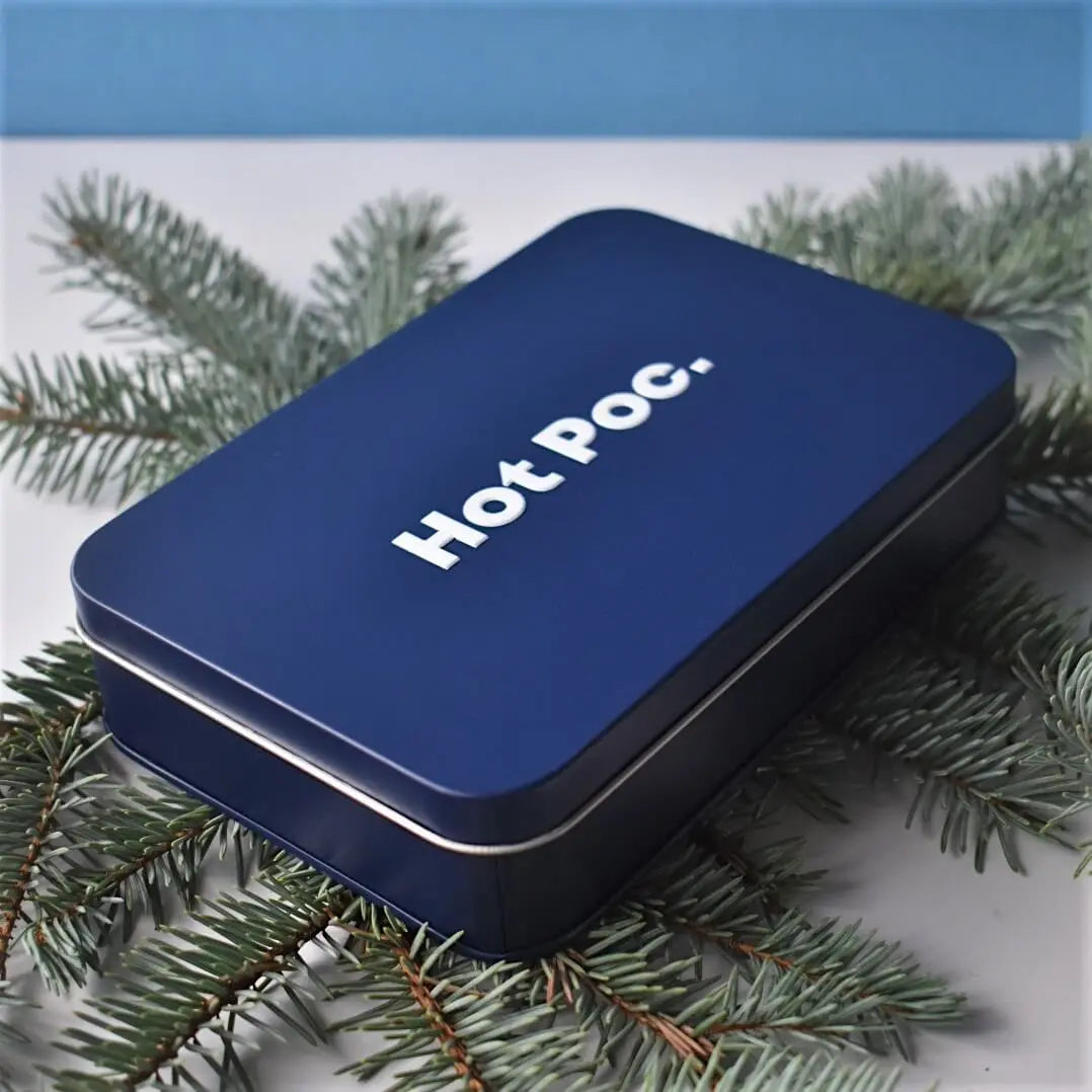 HotPoc eco-friendly reusable hand warmers in a 4-pack, shown in their storage case, designed for eco-conscious warmth and convenience.