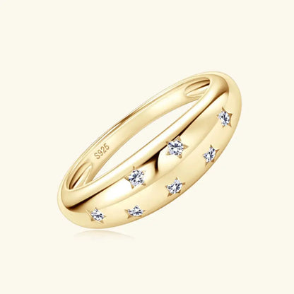 Sterling silver moissanite star ring featuring a celestial design, elegant jewelry piece with sparkling gemstone accents.