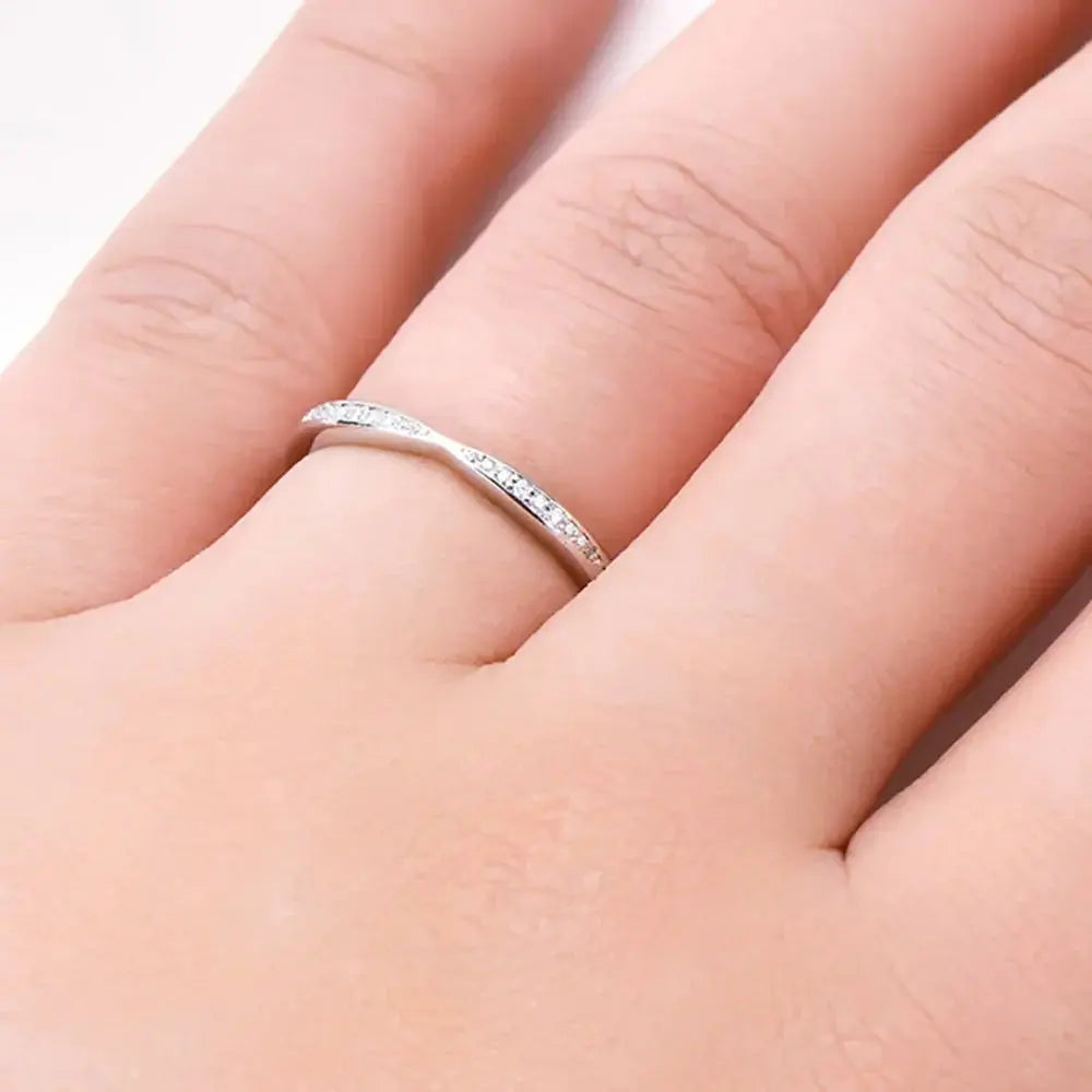 925 sterling silver moissanite ring featuring a sparkling gemstone and elegant band design, perfect for sophisticated jewelry collection.