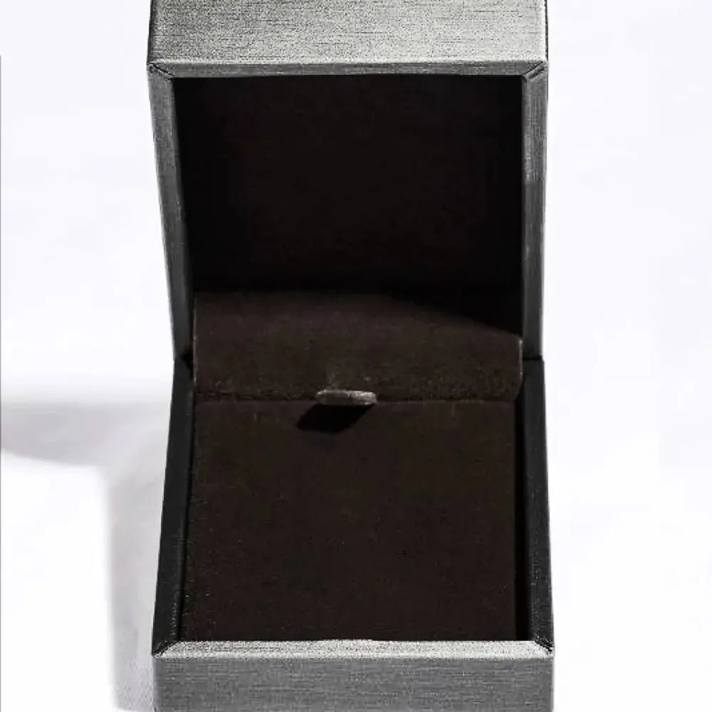 925 sterling silver moissanite ring showcasing a sparkling central gemstone with a sleek band for elegant jewelry style
