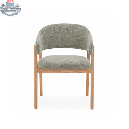 Mint green Hygge Design House dining chair with natural wood frame and upholstered seat, showcasing stylish and comfortable furniture design.