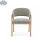 Mint green Hygge Design House dining chair with natural wood frame and upholstered seat, showcasing stylish and comfortable furniture design.