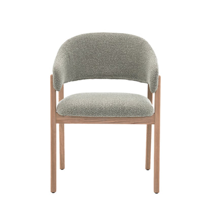 Mint green Hygge Design House Fiol dining chair with natural wood frame and upholstered seat, modern and stylish for dining rooms.