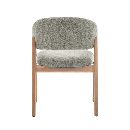 Mint green Hygge Design House Fiol dining chair with natural wood frame and upholstered seat and backrest.