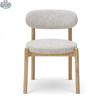 Hygge Design House Orazio dining chair with wooden legs and upholstered seat, modern and stylish for dining rooms