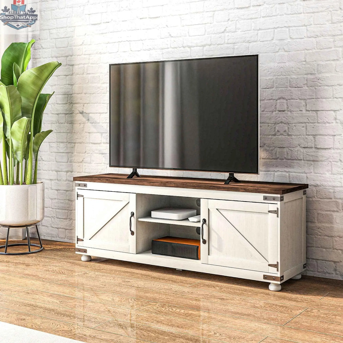 Distressed white Kirby Farmhouse TV stand by SLOTH Nation with small minimalist barn doors for 65-inch TVs in a living room setting