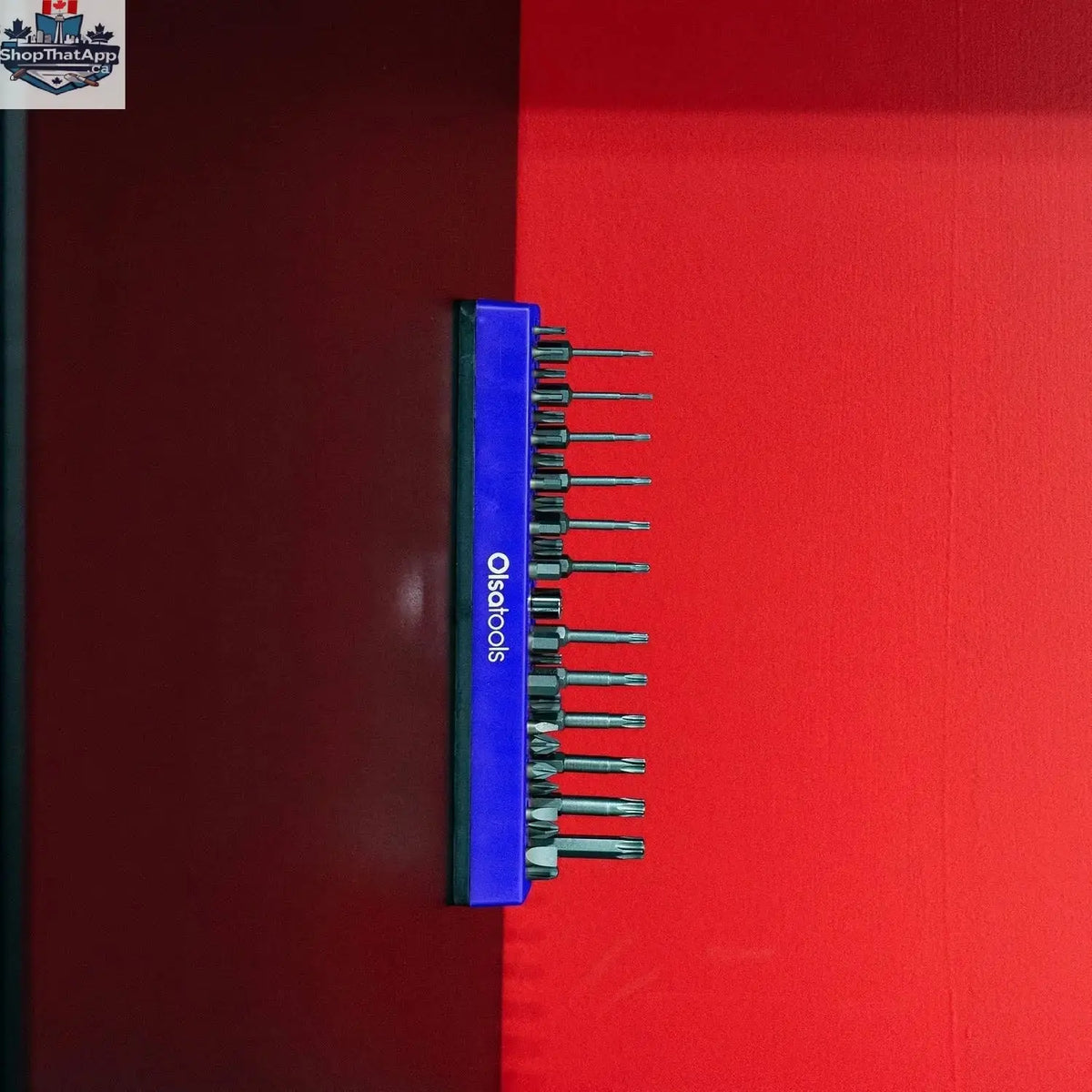 Olsa Tools Canada magnetic hex bit organizer holding multiple hex bits in a workshop setting