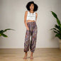 Purple paisley print pants by Suzie Blue Canada, boho chic style, featuring lightweight fabric and relaxed fit.