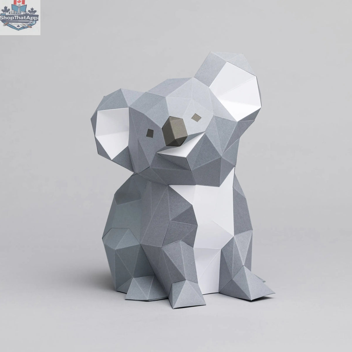 DIY Koala origami paper model craft by Sofs Lifestyle featuring folded paper koala figure on a neutral background.