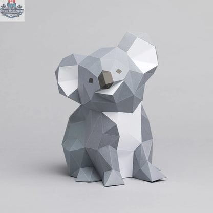 DIY Koala origami paper model craft by Sofs Lifestyle featuring folded paper koala figure on a neutral background.