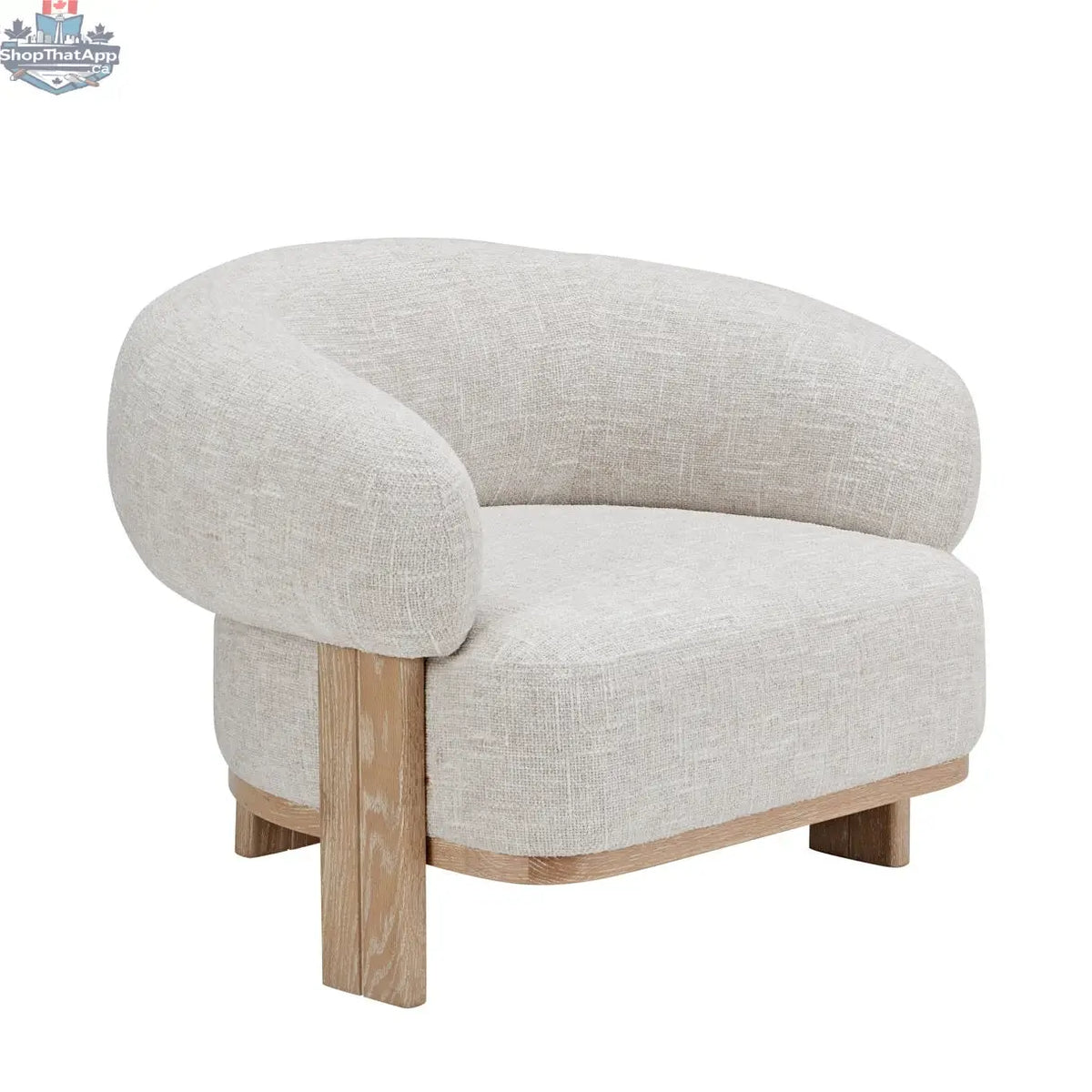 Cream textured fabric Konsta accent chair with a solid wood frame by Hygge Design House.
