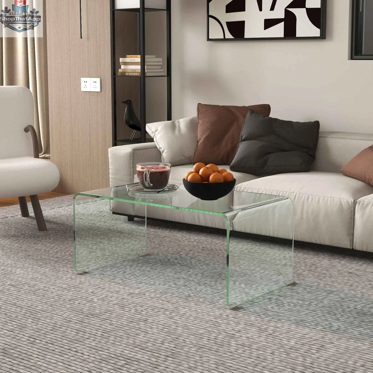 Modern glass coffee table by SLOTH Nation with rounded edges, featuring a sleek and contemporary furniture design.