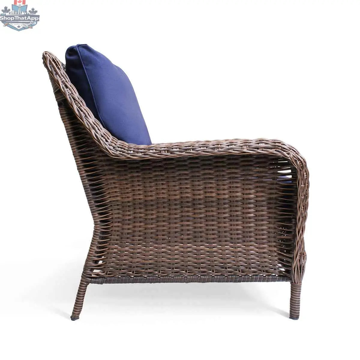 Krikacy Cambridge brown wicker outdoor club chair with indigo cushions, stylish patio seating for outdoor relaxation.