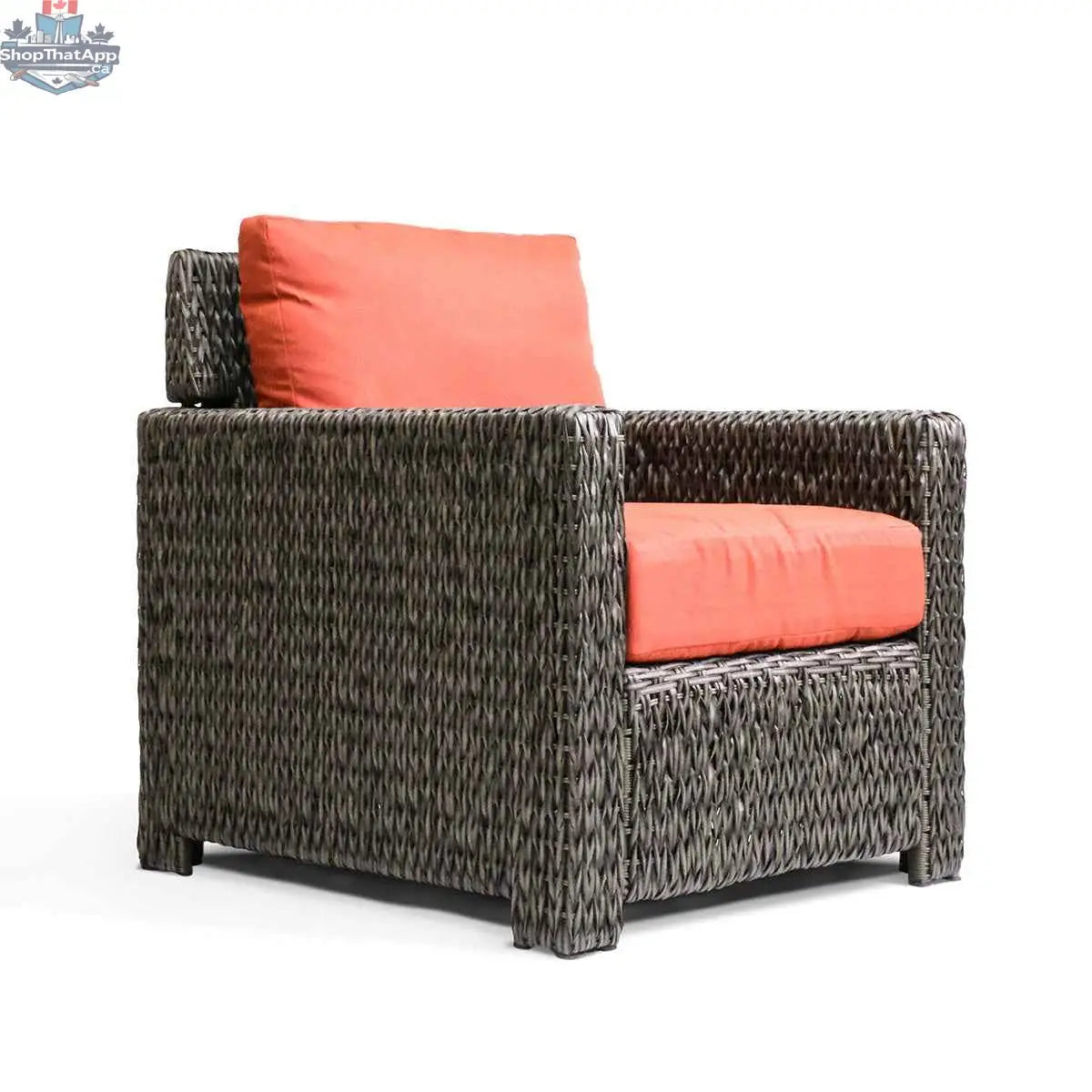 Krikacy Laguna Point wicker club chair with brown wicker frame and orange cushions for stylish outdoor patio relaxation.
