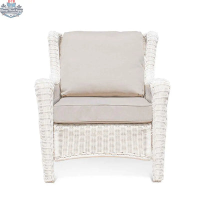 Krikacy Park Meadows white wicker outdoor club chair with plush cushion, stylish and durable patio seating for outdoor relaxation.