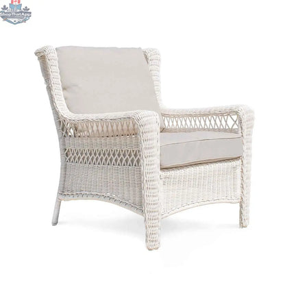 Krikacy Park Meadows white wicker outdoor club chair with plush cushions, stylish patio seating for outdoor relaxation.