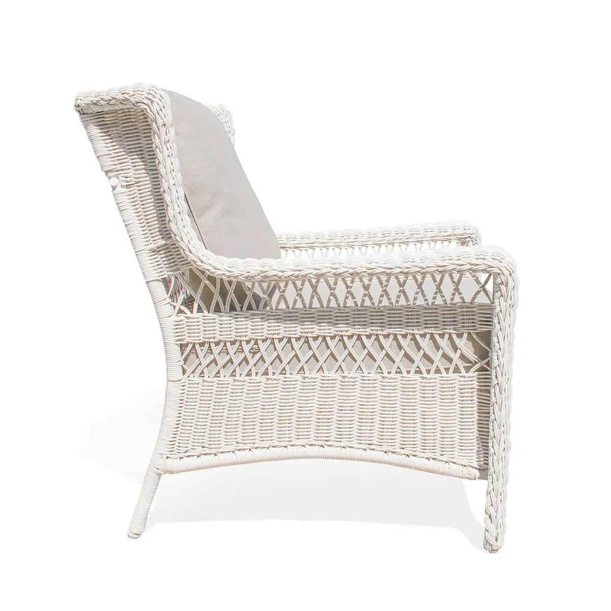 Krikacy Park Meadows white wicker outdoor club chair with cushioned seat and armrests, ideal for stylish patio seating.