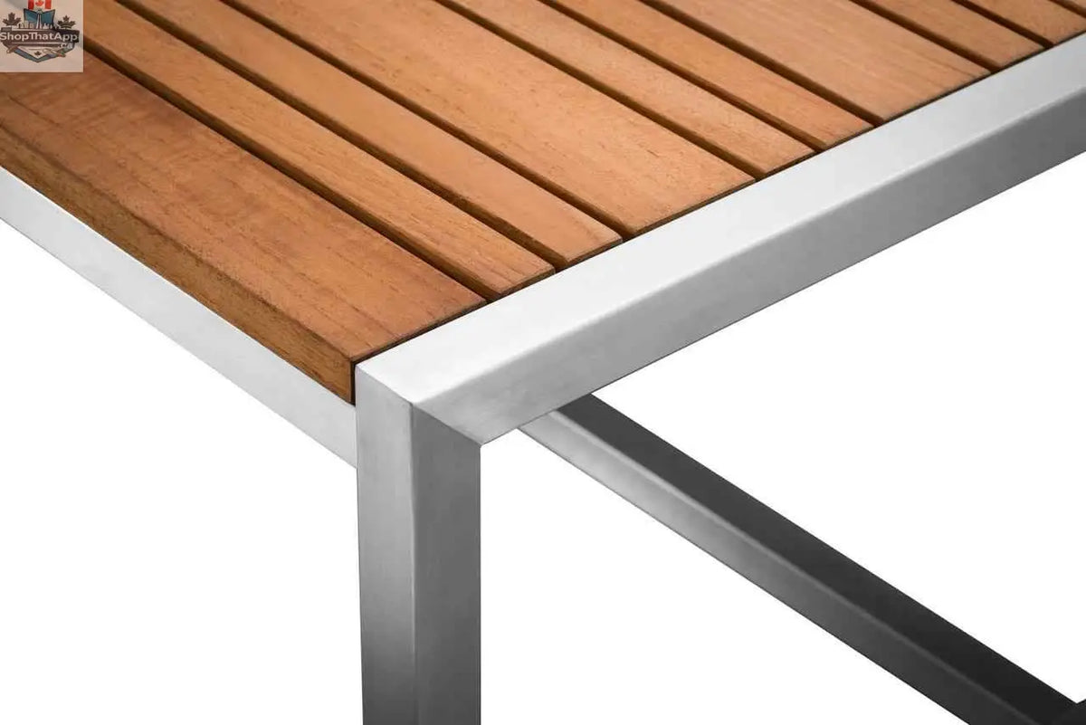 Krikacy acacia outdoor coffee table with stainless steel frame and teak top, ideal for stylish outdoor living spaces.
