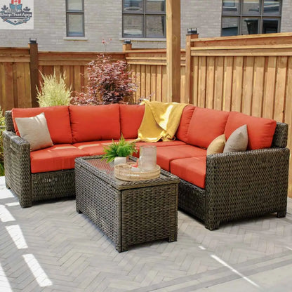 Krkacy Laguna Point wicker outdoor storage chest coffee table with Park Meadows wicker chair in a stylish patio setting