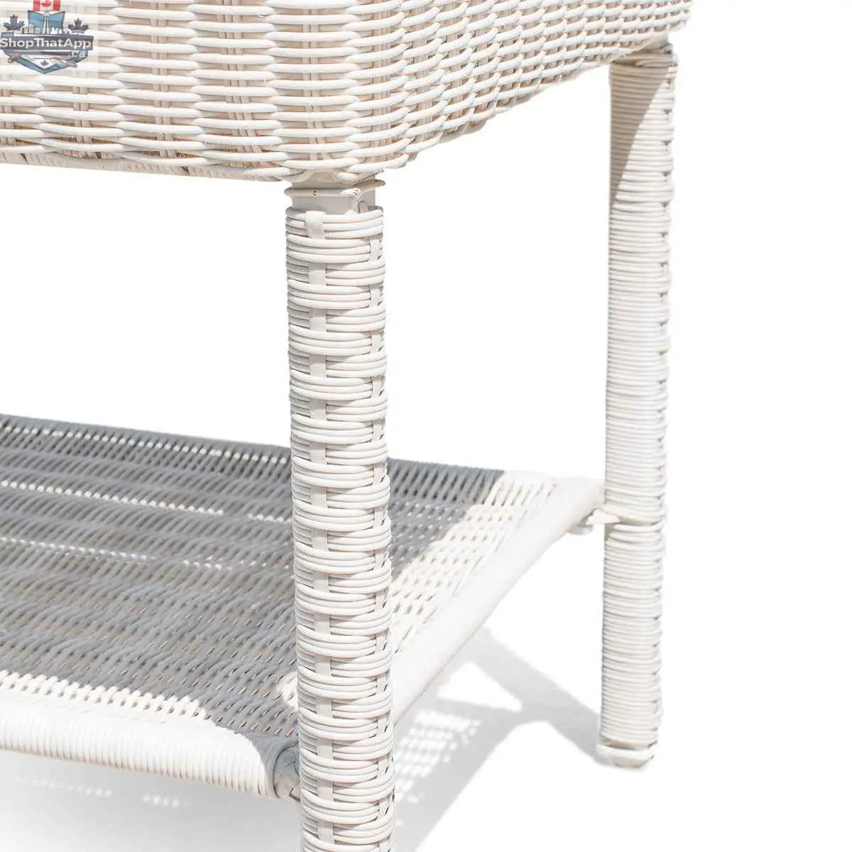 Krikacy Park Meadows outdoor wicker coffee table with white finish, featuring a round design and woven wicker surface for outdoor living.