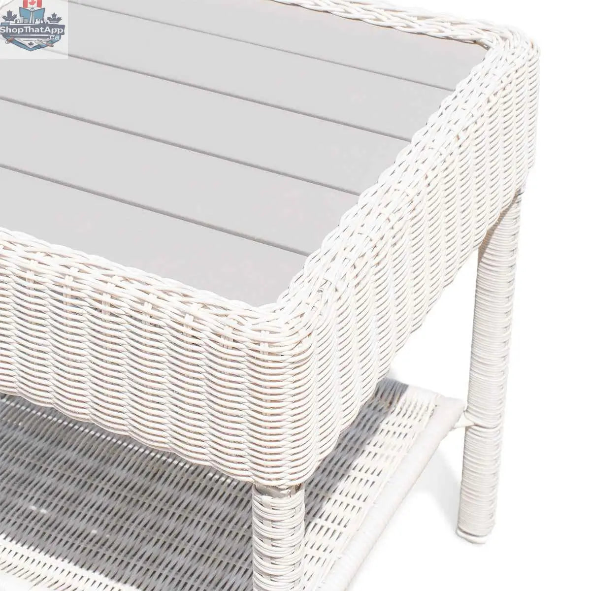 White wicker outdoor coffee table with slatted top, designed for outdoor living by Krikacy.