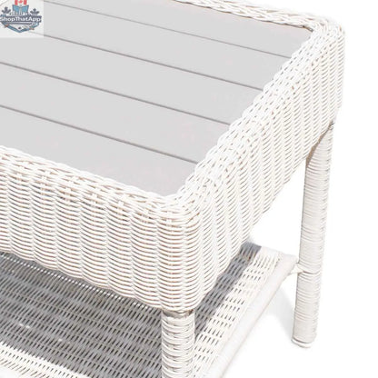 White wicker outdoor coffee table with slatted top, designed for outdoor living by Krikacy.
