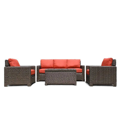 Krikacy Laguna Point outdoor wicker conversational set with four pieces, featuring brown furniture and orange cushions.