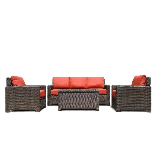 Krikacy Laguna Point outdoor wicker conversational set with four pieces, featuring brown furniture and orange cushions.