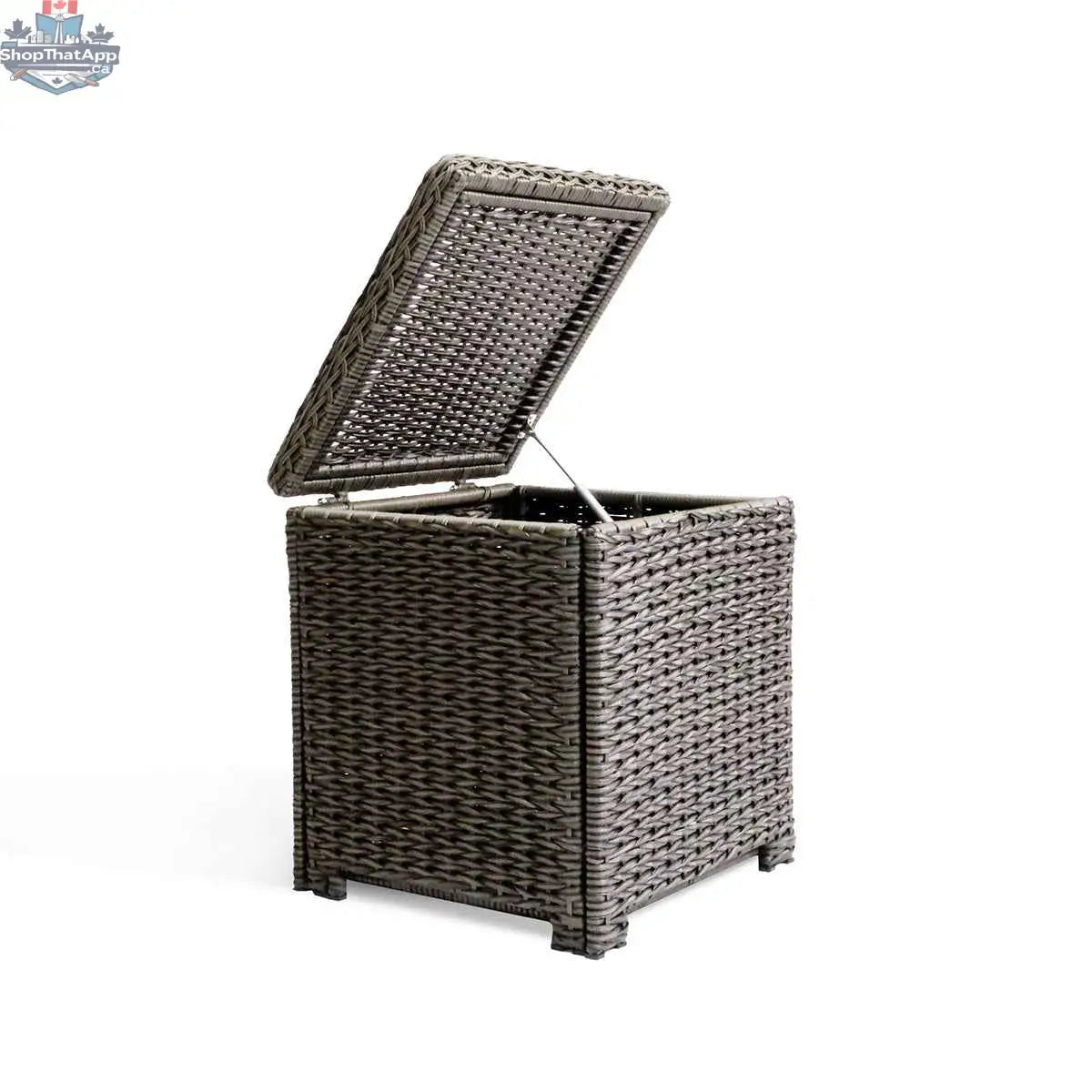 Krikacy Laguna Point brown wicker outdoor storage chest used as an end table with open lid showing storage space.