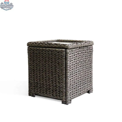 Krikacy Laguna Point brown wicker outdoor storage chest and end table with a sturdy design and woven wicker finish.