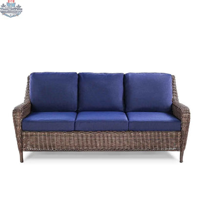 Krikacy Cambridge wicker outdoor loveseat sofa with brown wicker frame and indigo cushions, front view.