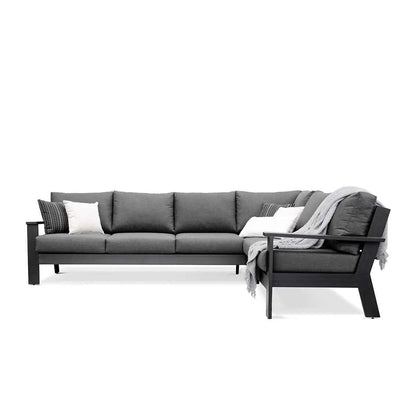 Magnolia black aluminum sectional sofa by Krikacy with Sunbrella® cast slate cushions, showcased front view.