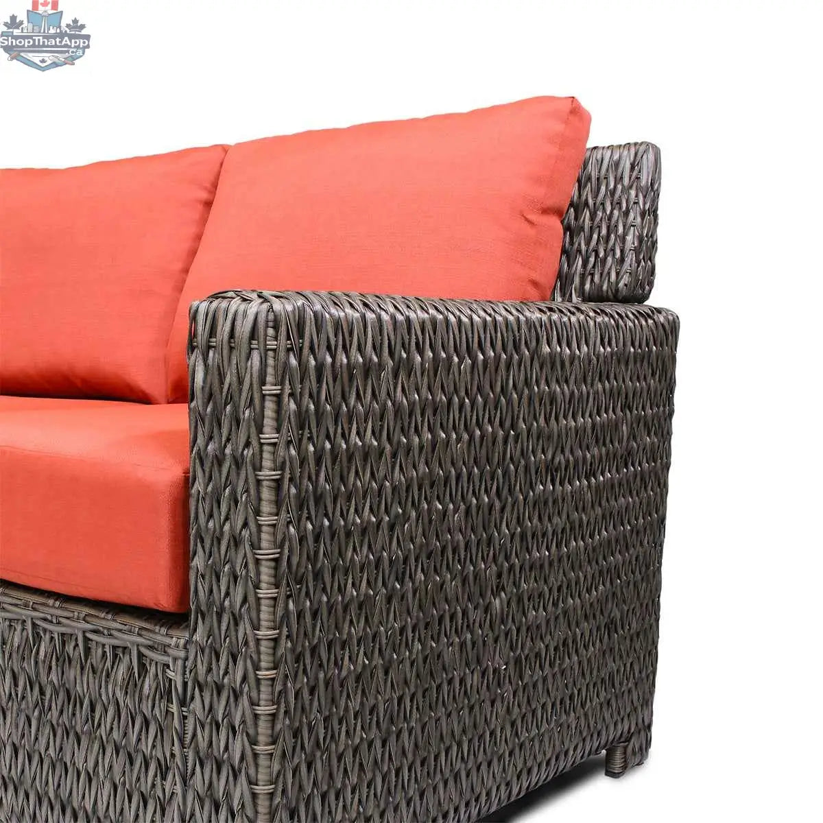 Krikacy Laguna Point outdoor wicker sofa with brown cushions, stylish sectional seating for patio relaxation.