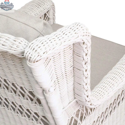 Krikacy Park Meadows white wicker outdoor swivel chair with cushioned seat and backrest, ideal for relaxing outdoor spaces.